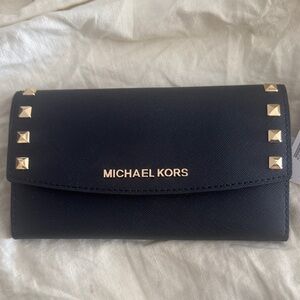 Michael Kors black/gold Lg Trifold leather wallet.